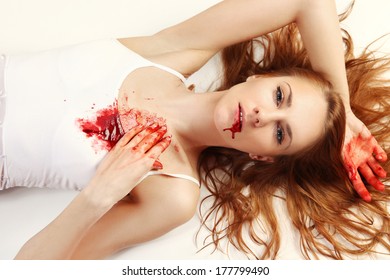 young women with blood on her face