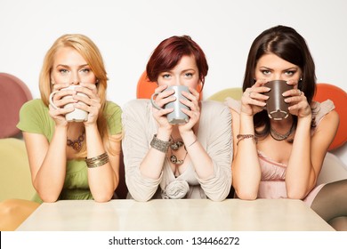 Young Women Drinking Coffee
