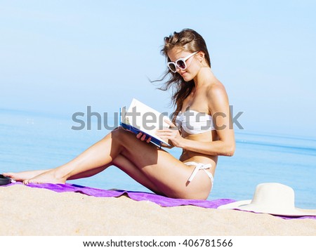 Young women enjoying vacation at the beach