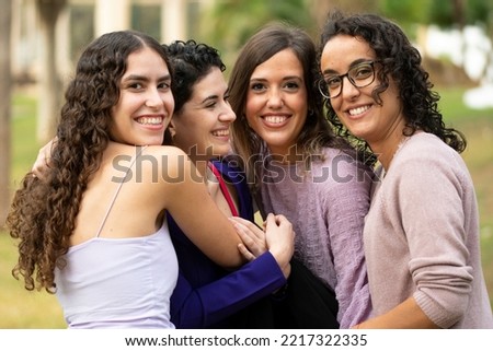 Similar – Happy women looking at camera over garden fence