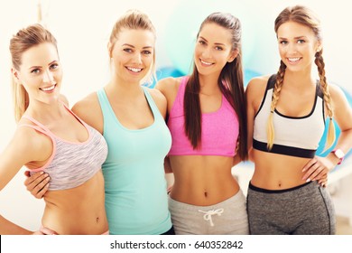 Young Women Group Resting At The Gym After Workout