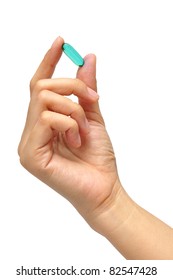 Young Women holding Medicine capsule in a hand on white background.Concept for Healthcare.
