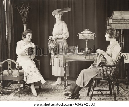 Young women knitting at home