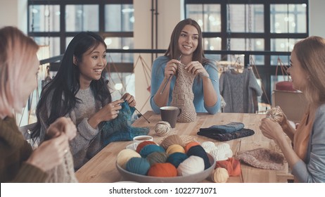 Young Women In Knitting Studio