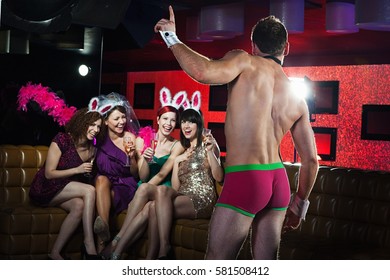 Young Women On Hen Night With Male Stripper