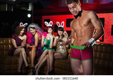 Young Women On Hen Night With Male Stripper