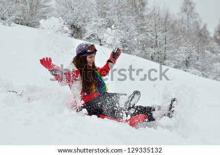 young women outdoor in winter enjoying the snow