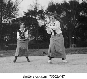 Young Women Playing Baseball In Middy Shirts And Long Skirts In 1919. Washington, D.C.