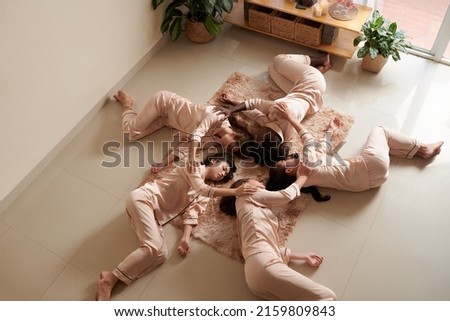 Similar – Image, Stock Photo Relaxed mother and sons playing over the bed