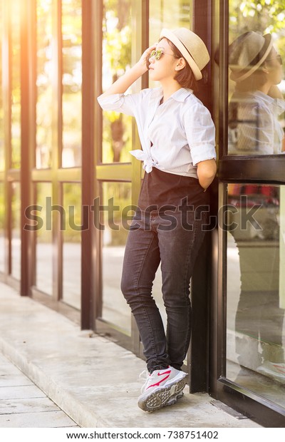 Young Women Short Hair Wearing Hat Stock Photo Edit Now 738751402