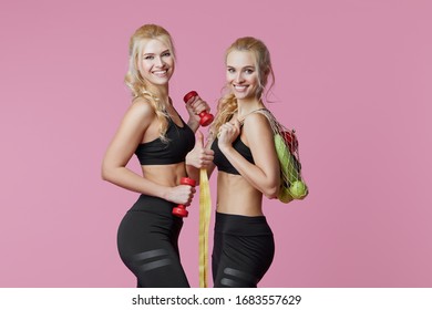 Young Women Sportswoman With Dumbbells And Fresh Vegetables In A String Bag. Healthy Eating And Dieting Concept.