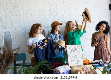 Young women at swap home party - clothes, shoes, bags, jewellery exchange between friends. Zero waste shopping, eco friendly concept, sustainable lifestyle. College life.  - Shutterstock ID 2138187949