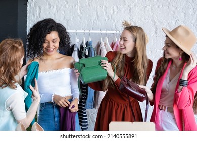 Young Women At Swap Party. Trying On Casual Clothes, Shoes, Hats, Bags, Jewellery. Idea Of Exchange Your Old Wardrobe For New. Eco Friendly Cloth Concept. Zero Waste Shopping, Reduce And Reuse, Donate