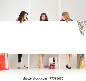 Young Women Trying Clothes Shop Wordrobe