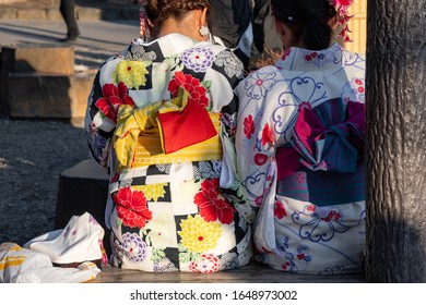 Young women wearing colorful kimono in Sensō-ji temple area. Tokyo, Japan.