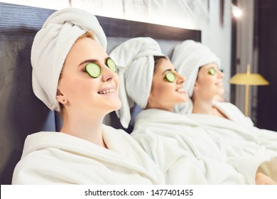 Young Women In White Bathrobe At A Spa Party