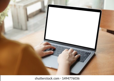 Young women working on her laptop with blank copy space screen for your advertising text message in office, Back view of business women hands busy using laptop at office desk. - Shutterstock ID 1494776036