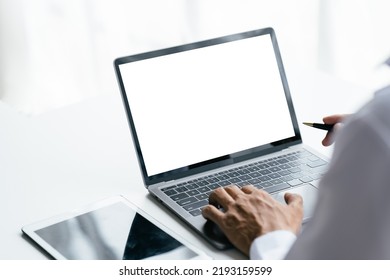 Young women working on her laptop with blank copy space screen for your advertising text message in office, Back view of business women hands busy using laptop at office desk.
