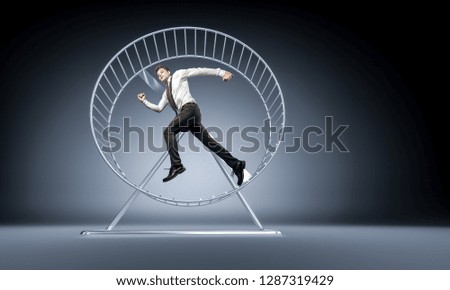 young worker run in hamster slave