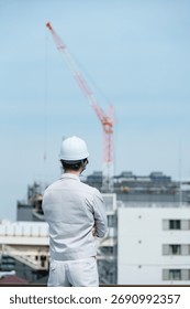 Young worker in work clothes