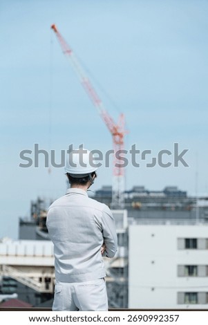Young worker in work clothes