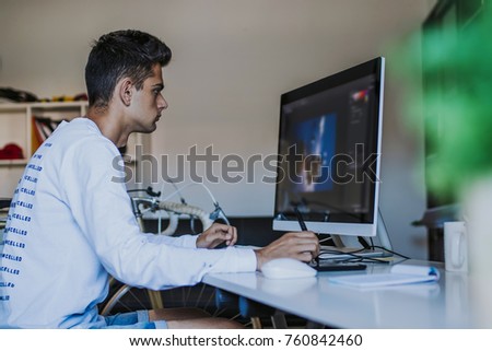 young working with the computer at home or in the office