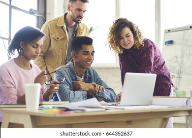 Young working team  communicating with colleagues through video chat discussing ideas creating startup collaborating, international students watching movie on training lesson via laptop computer - Shutterstock ID 644352637