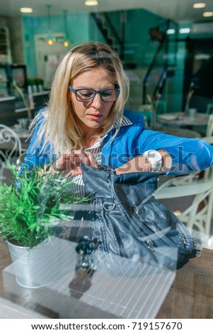 Similar – Image, Stock Photo Girl stiring coffee and looking her tablet