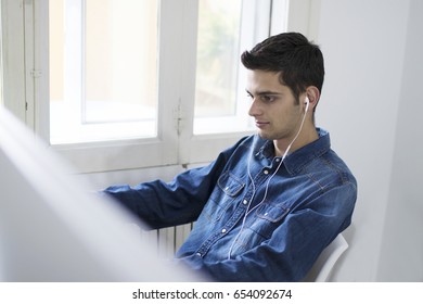 young working with your computer at home or in the office man