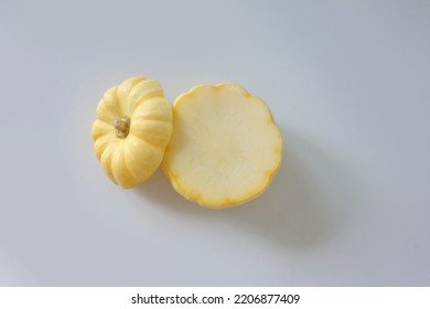 Young Yellow Pumpkin Isolated On White Background. Yellow Baby Japan Pumpkin Organic Vegetable On White. Pumpkin Squash Haloween            