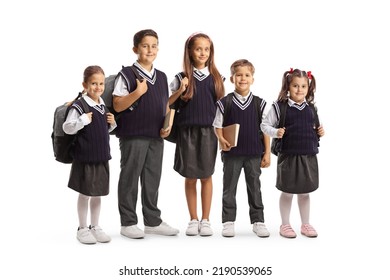 Younger And Older Schoolchildren In School Uniforms Isolated On White Background