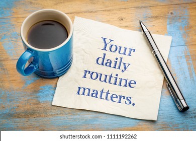 Your daily routine matters - handwriitng on napkin with a cup of coffee - Shutterstock ID 1111192262