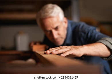 Your dream job does not exist, you must create it. Cropped shot of a senior man working with wood indoors. - Powered by Shutterstock