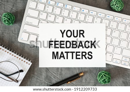 YOUR FEEDBACK MATTERS is written in a document on the office desk with office accessories.