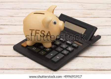 Your TFSA Savings, A golden piggy bank and calculator on a wood background with text RRSP