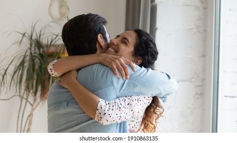 In Your Warm Embraces. Excited Wife Holding Beloved Husband Tight In Arms Grateful For Support Love Care. Young Couple Hug Reconciling After Family Fight Or Missing Each Other Spending Long Time Apart