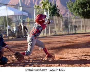 Youth Baseball Player Up To Bat, Strike, Swing And Miss