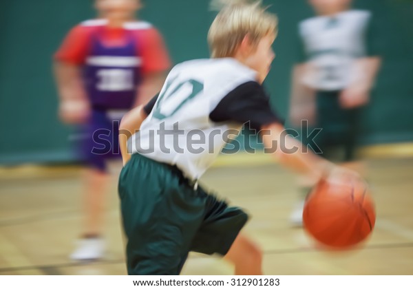 Youth basketball motion\
blurred image.