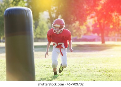 Youth Football Player Practicing