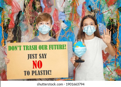 Youth generation protesting against plastic pollution – creative children involved in climate change and environmental earth problem – No plastic planet sign of kids school project for global warming