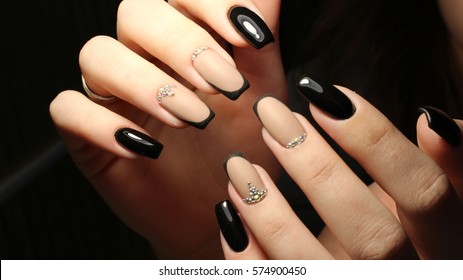 Youth manicure design, color coffee with rhinestones and black
