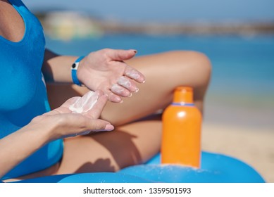 Youth And Skin Protection. The Application Of A Sunscreen Cream.