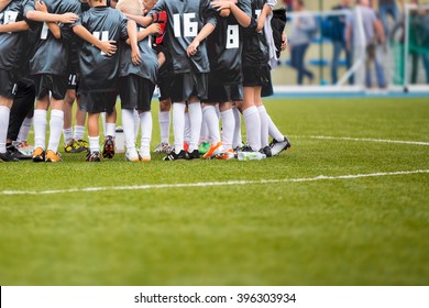 Youth Soccer Football Team Gathering Before The Tournament Final Match. Coach Giving Team Talk