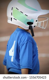 Youth Softball Player Standing On Base