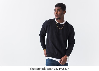 Youth Street Fashion Concept - Portrait Of Confident Sexy Black Man In Stylish Sweatshirt On White Background.