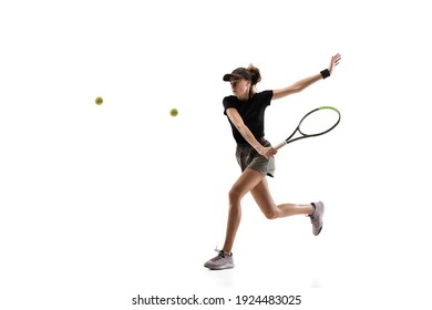 Youth. Young caucasian professional sportswoman playing tennis isolated on white background. Training, practicing in motion, action. Power and energy. Movement, ad, sport, healthy lifestyle concept.