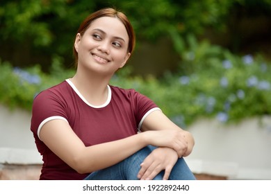Youthful Minority Female And Happiness Sitting