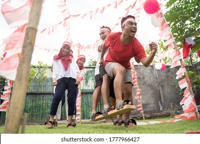 youths followed the bakiak race on the 17th of August Independence Day in Indonesia