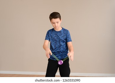Yoyo trick performed by young boy