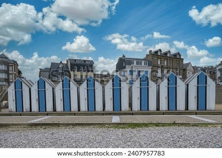 Yport, wooden beach cabins in Normandy, on the pebble beach